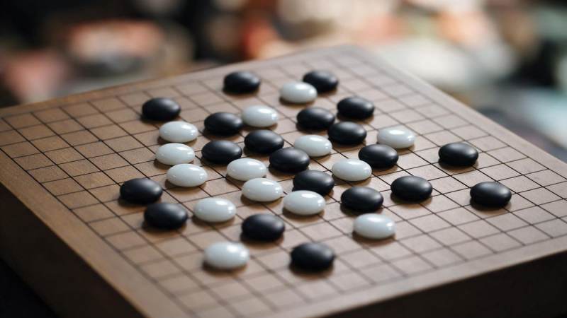 掼蛋逢人配怎么用才不吃亏？关键时机与组牌思路